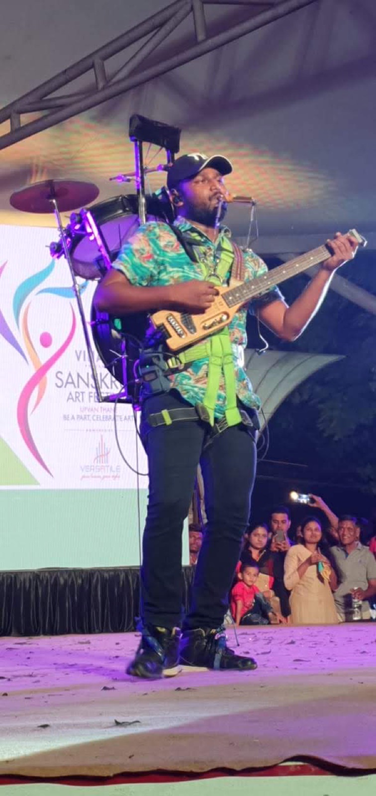 Gladson Peter performing at a festival
